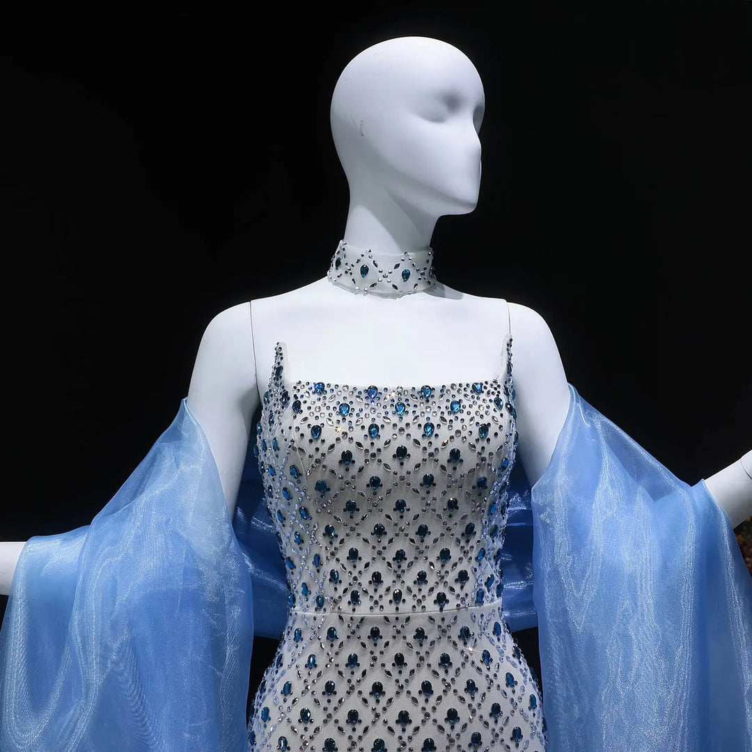 Luxury Crystal-Embellished Column Gown with Sheer Blue Cape and Choker Neckline SB002