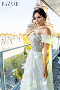 Elegant Beige Embellished Evening Gown with Petal Detailing SB011