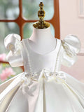 Penelope's White Pearl Bow Dress
